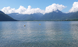 Lake with mountains in the background