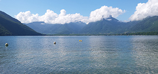 Lake with mountains in the background