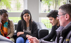 Small group of students having a discussion