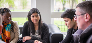 Small group of students having a discussion